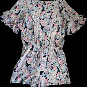 Lilly Pulitzer romper with short ruffled sleeves. Size large.